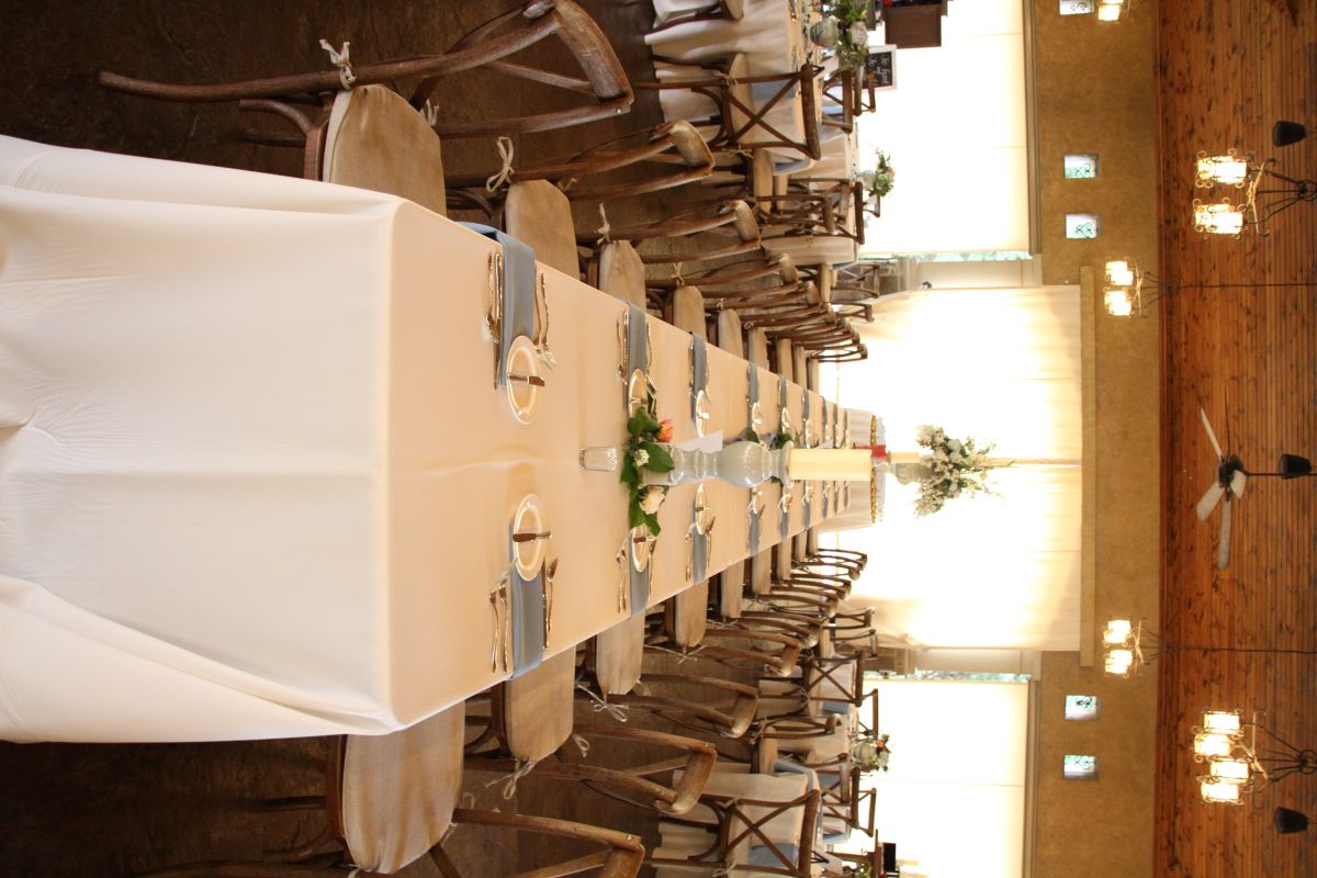90x156 Ivory Solid Tablecovers on 8'x30" Tables